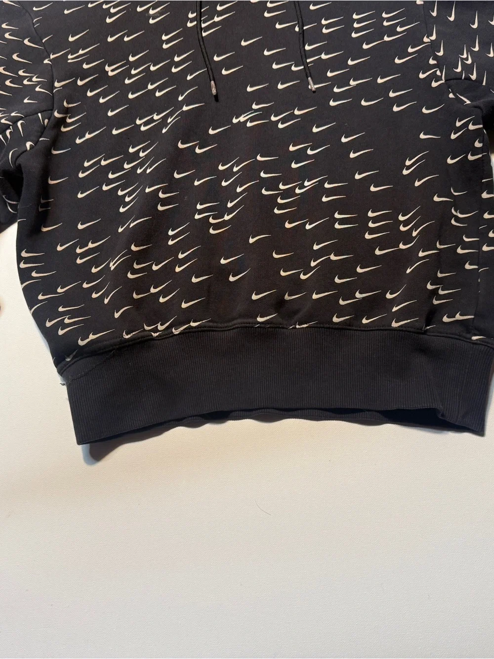 Nike‎ Black Hoodie with Repeating White Swoosh Print